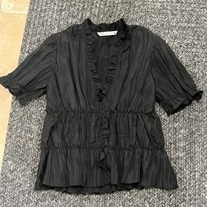 Black textured ruffle top